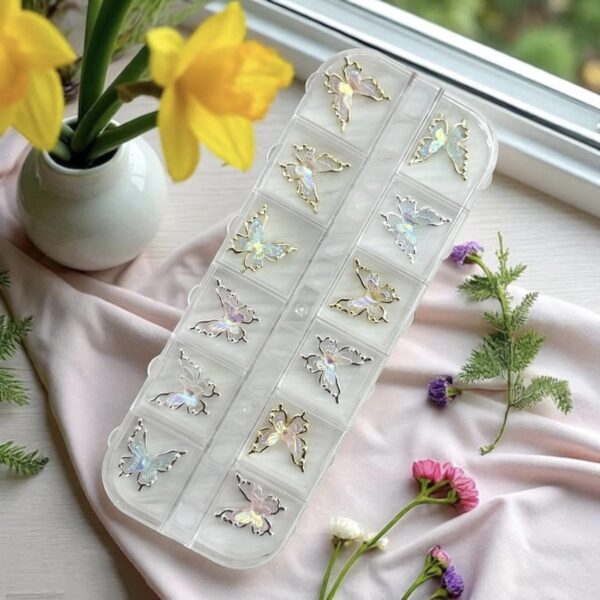 Dijes mariposa en caja x 12 - Naez