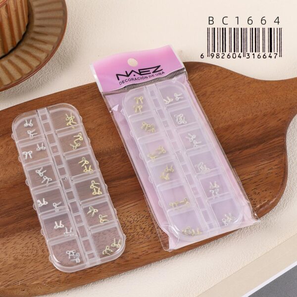 Dije moños texturado en caja - Naez