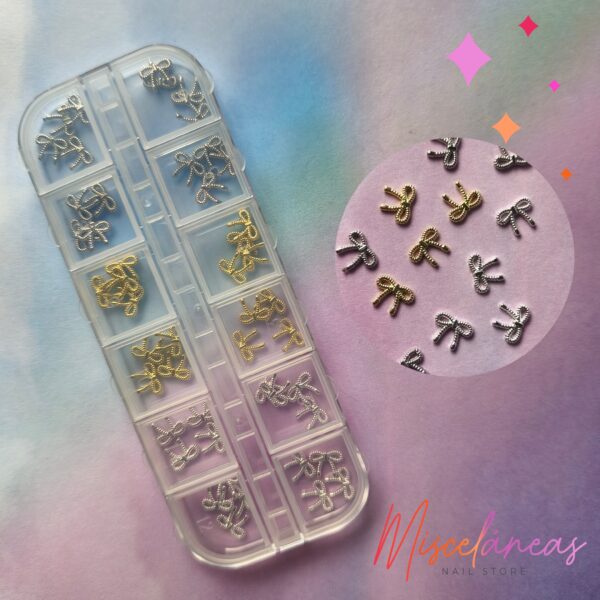 Dijes moño oro plata y plomo - Magic Girl